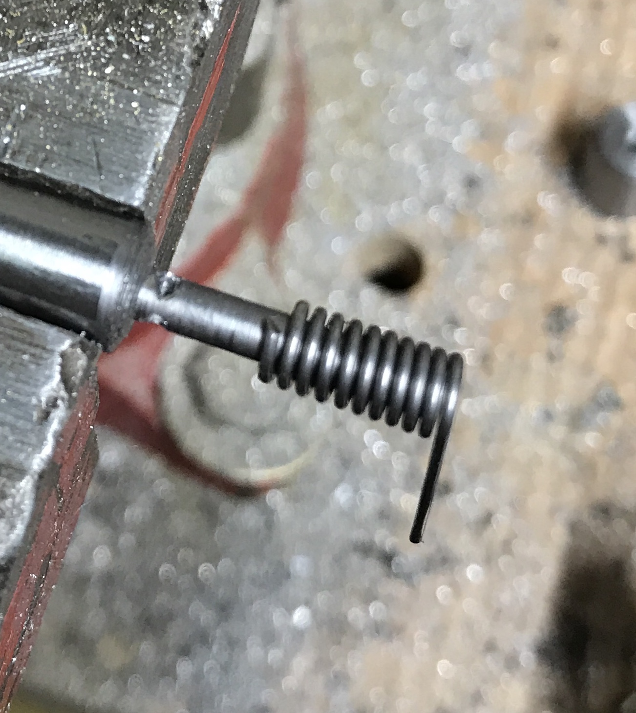 The spring cut loose from the mandrel